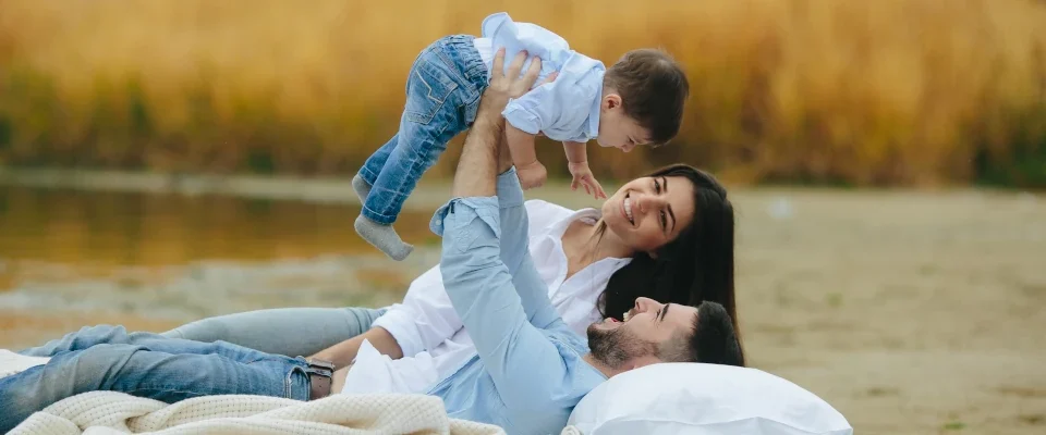 couple having fun with son