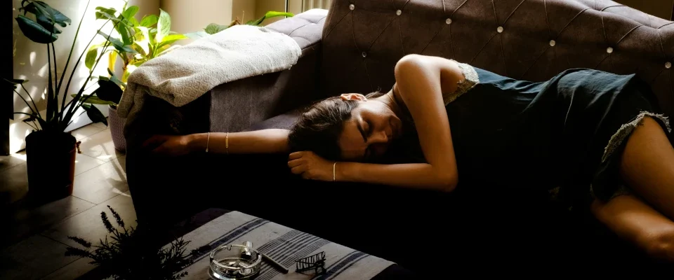 a woman lying on a couch